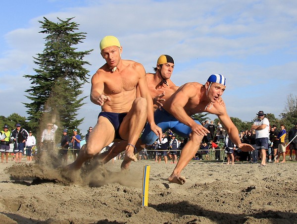 beach flags competitors, from left, Paul Cracroft-Wilson (Fitzroy), Ben Willis (Paekakariki) and Morgan Foster (South Brighton), who will all compete at the Northern Region championships in Mount Maunganui this weekend.